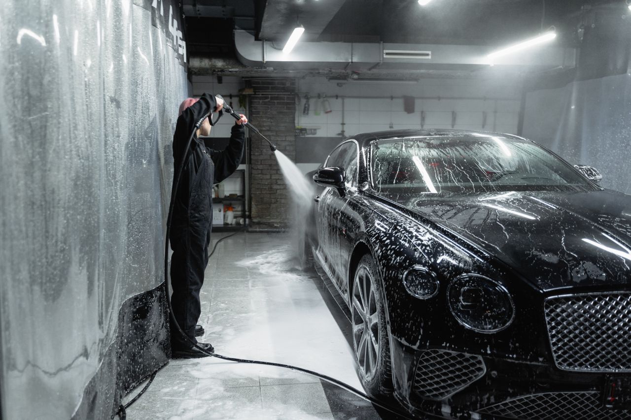 Car being washed at Valvoline Xpress Lube car wash bay