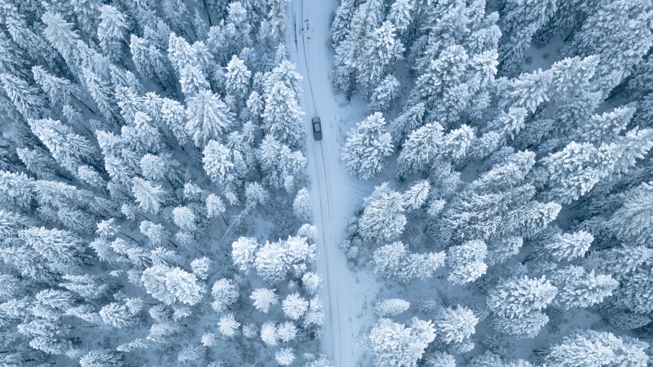 Valvoline Xpress Lube car covered in snow during Vermont winter